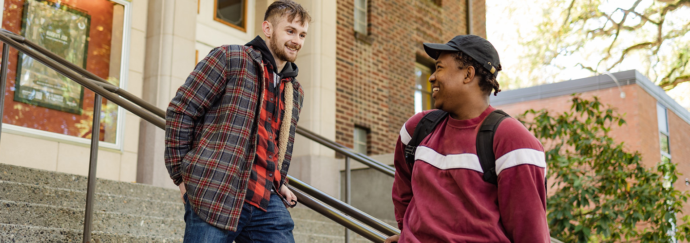 SBGE students outside of campus building